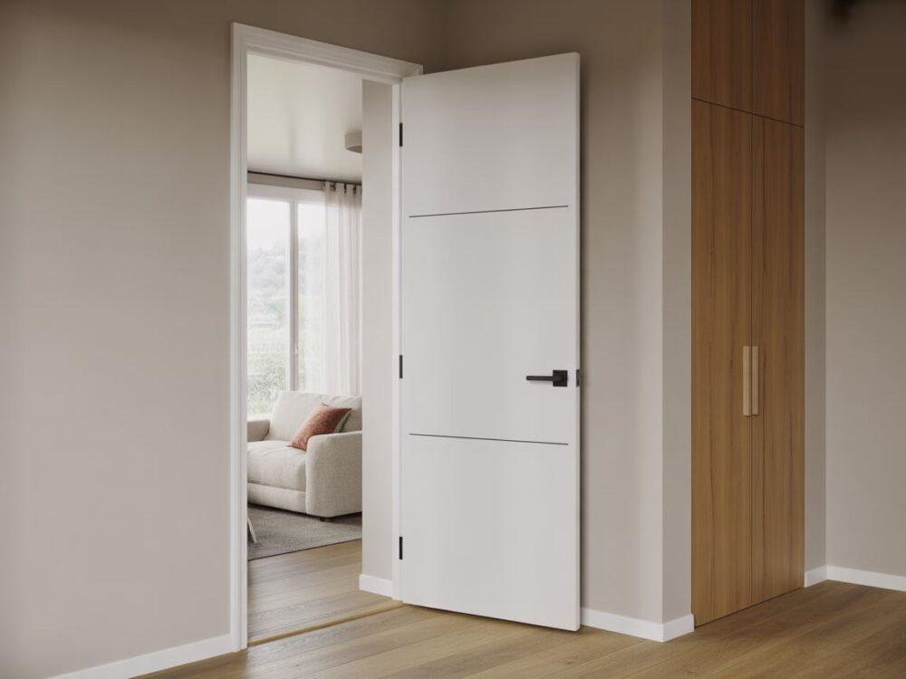 białe drzwi do podłogi dębowej